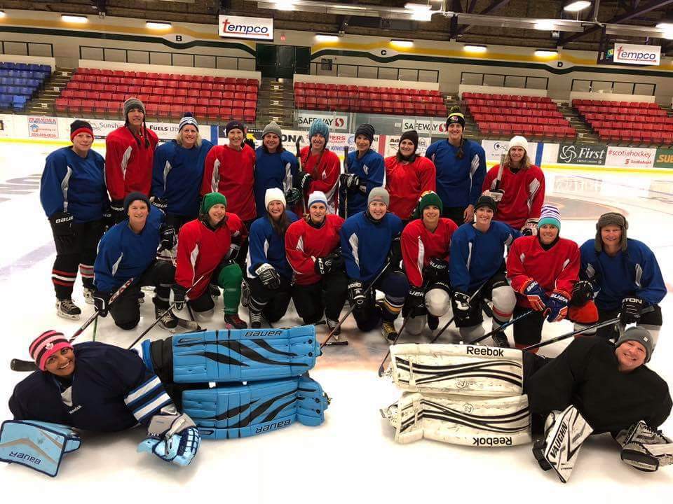 Suzi Wiebe with her hockey team