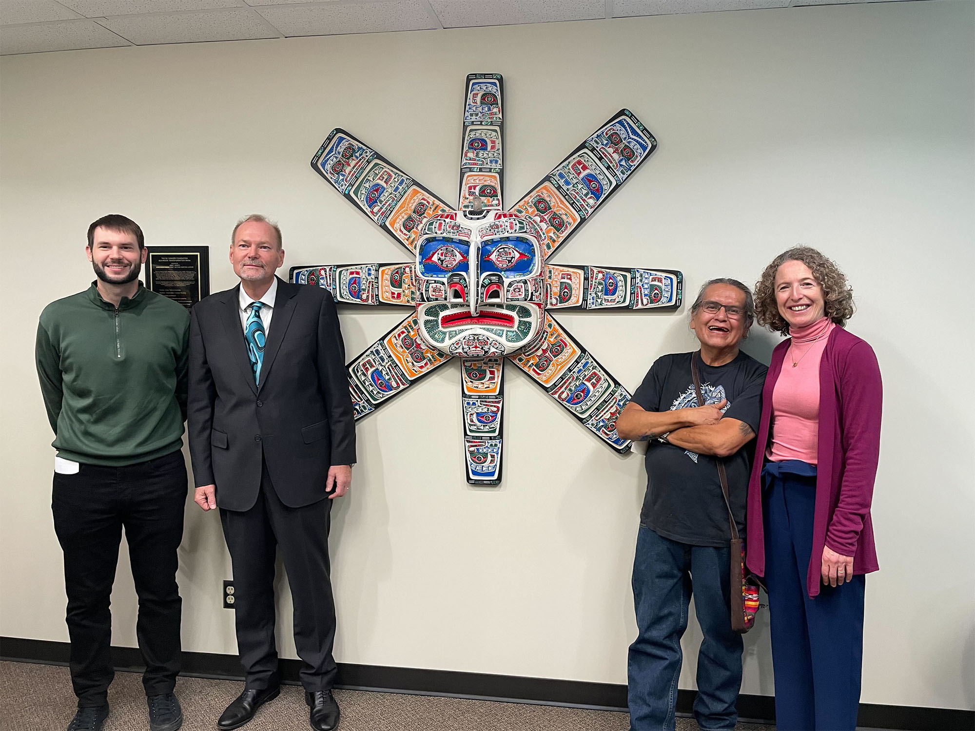 The McCarthy family presented the Moon-Sun Transformation Mask with Kwakwaka’Wakw First Nations Master Carver, Jimmy Joseph to the BC Cancer Foundation