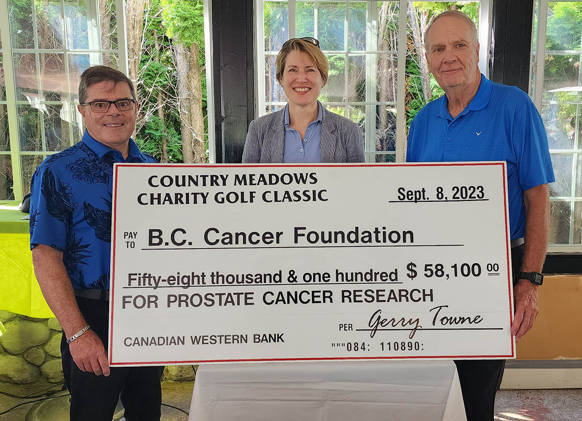 Country Meadows’ Gerry Towne and Dave Mickie present Dr. Marianne Sadar (middle) with a cheque to BC Cancer Foundation