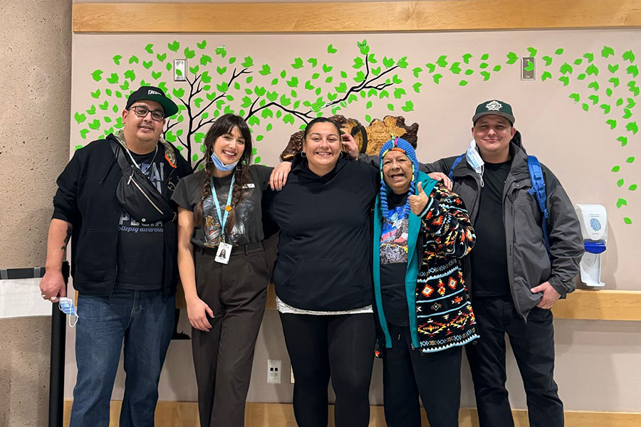 Mama Crow's family with Indigenous Patient Navigator, Vanessa Prescott